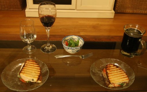 Grilled sandwiches on table.